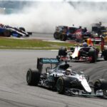 Hamilton leads at the start as Rosberg smokes his tires after getting spun by Vettel