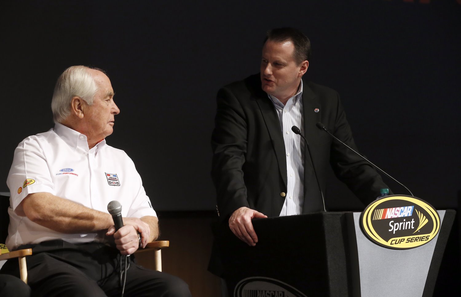 Roger Penske (L)