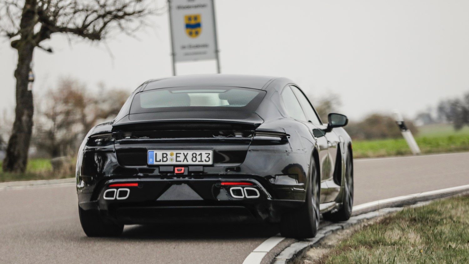 The still heavily camouflaged Porsche Taycan