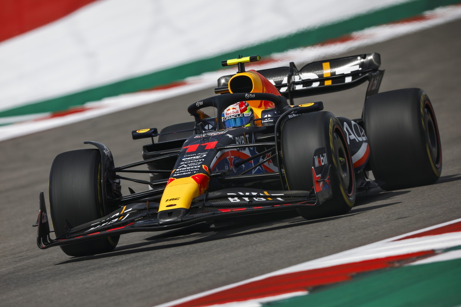 Sergio Perez of Mexico driving the (11) Oracle Red Bull Racing RB19 on track during the Sprint Shootout ahead of the F1 Grand Prix of United States at Circuit of The Americas on October 21, 2023 in Austin, Texas. (Photo by Chris Graythen/Getty Images)