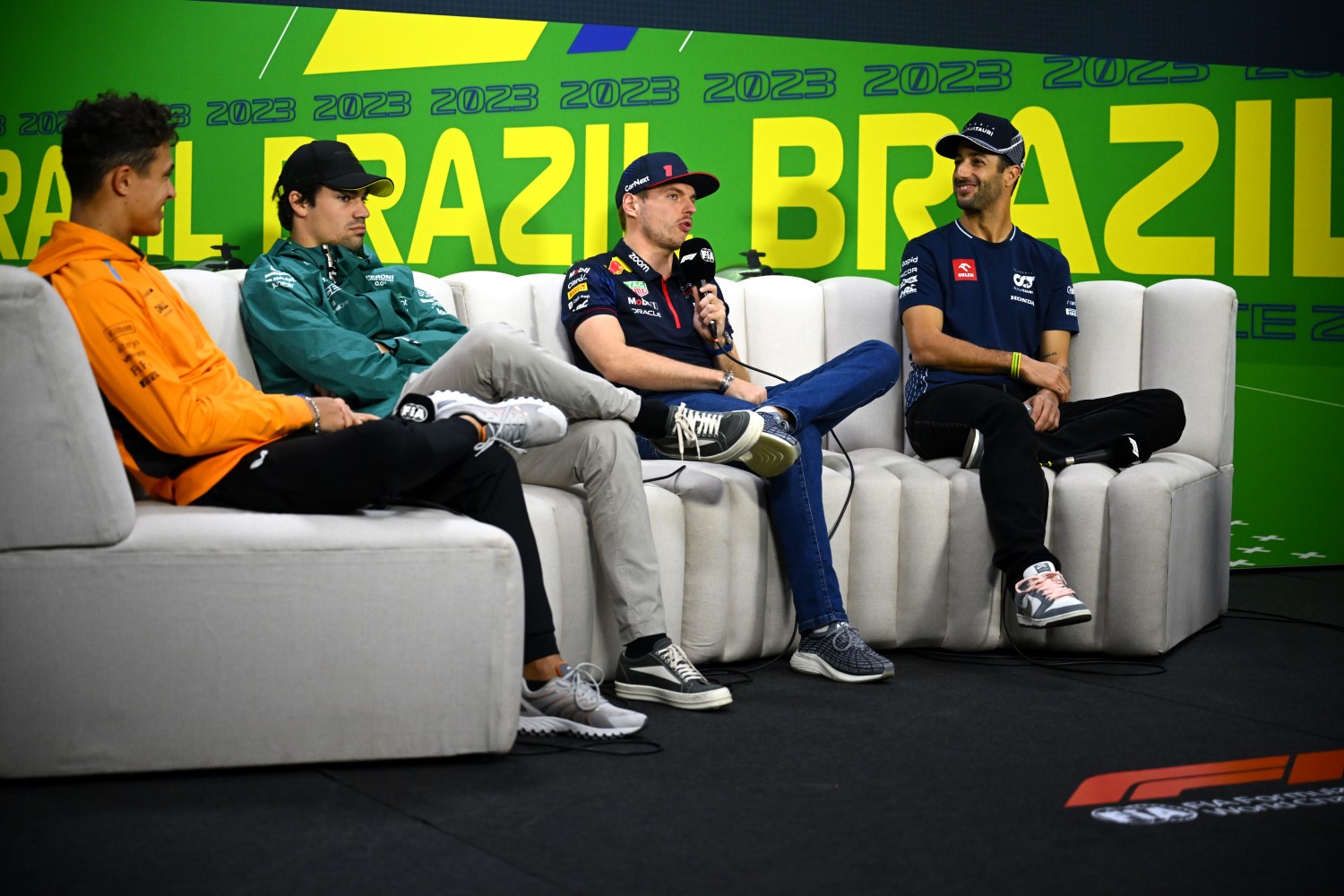 Max Verstappen of the Netherlands and Oracle Red Bull Racing talks in the Drivers Press Conference as Lando Norris of Great Britain and McLaren, Lance Stroll of Canada and Aston Martin F1 Team and Daniel Ricciardo of Australia and Scuderia AlphaTauri look on during previews ahead of the F1 Grand Prix of Brazil at Autodromo Jose Carlos Pace on November 02, 2023 in Sao Paulo, Brazil. (Photo by Clive Mason/Getty Images) // Getty Images / Red Bull Content Pool