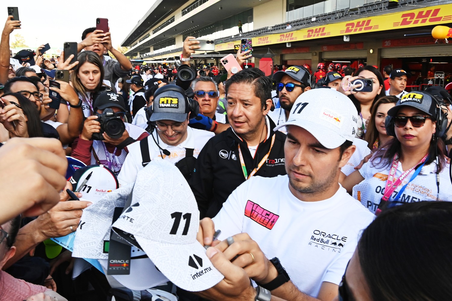 Sergio Perez of Mexico and Oracle Red Bull Racing greets fans in the Pitlane during previews ahead of the F1 Grand Prix of Mexico at Autodromo Hermanos Rodriguez on October 26, 2023 in Mexico City, Mexico. (Photo by Getty Images/Getty Images)