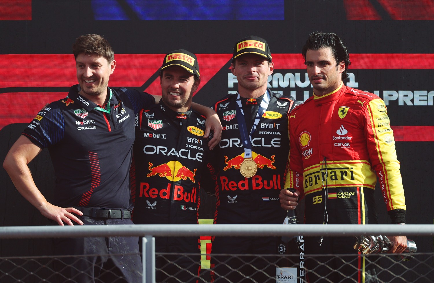 Race winner Max Verstappen of the Netherlands and Oracle Red Bull Racing, Second placed Sergio Perez of Mexico and Oracle Red Bull Racing and Third placed Carlos Sainz of Spain and Ferrari celebrate on the podium during the F1 Grand Prix of Italy at Autodromo Nazionale Monza on September 03, 2023 in Monza, Italy. (Photo by Ryan Pierse/Getty Images) // Getty Images / Red Bull Content Pool