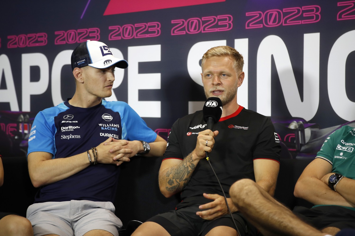 Logan Sargeant, Williams Racing and Kevin Magnussen, Haas F1 Team   attend the Thursday press conference during the Singapore GP at Marina Bay Street Circuit on Thursday September 14, 2023 in Singapore, Singapore. (Photo by Jake Grant / LAT Images)