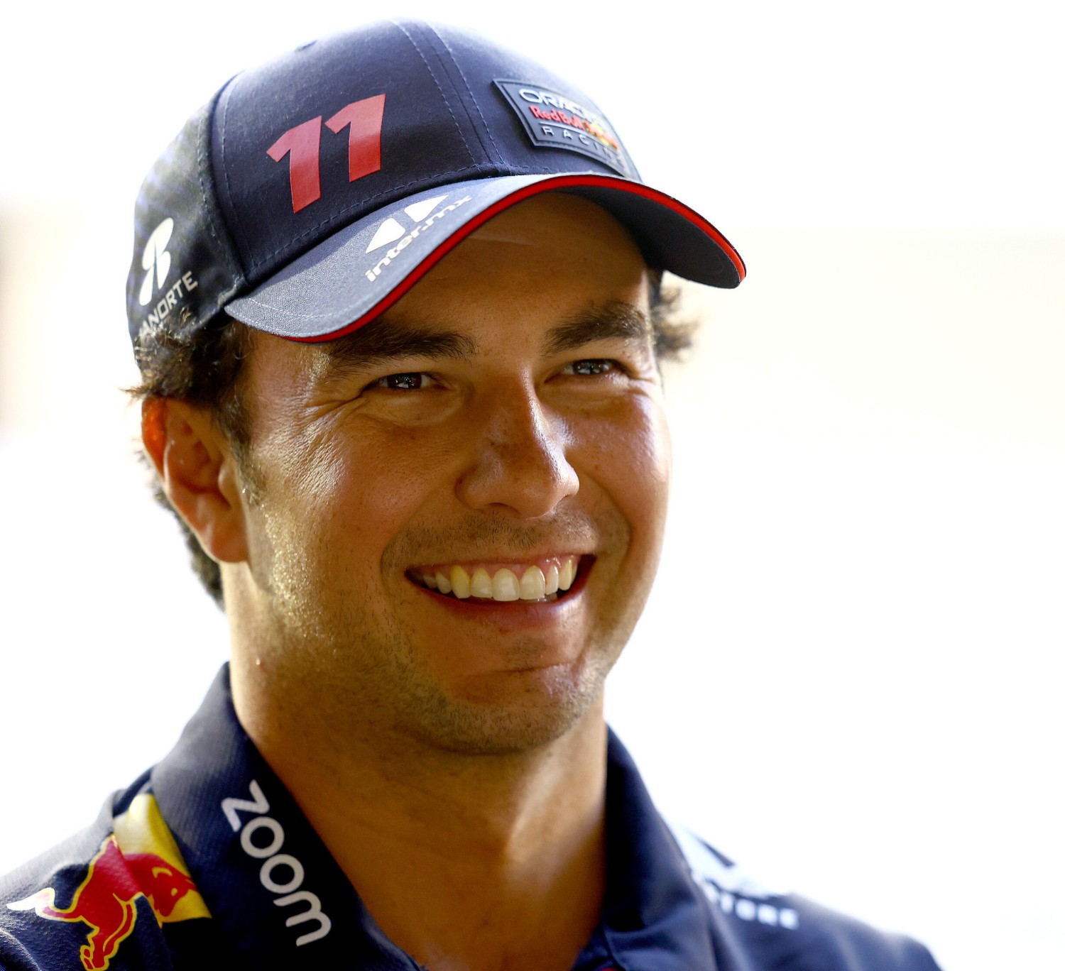 Sergio Perez of Mexico and Oracle Red Bull Racing looks on in the Paddock during previews ahead of the F1 Grand Prix of Singapore at Marina Bay Street Circuit on September 14, 2023 in Singapore, Singapore. (Photo by Mark Thompson/Getty Images) // Getty Images / Red Bull Content Pool