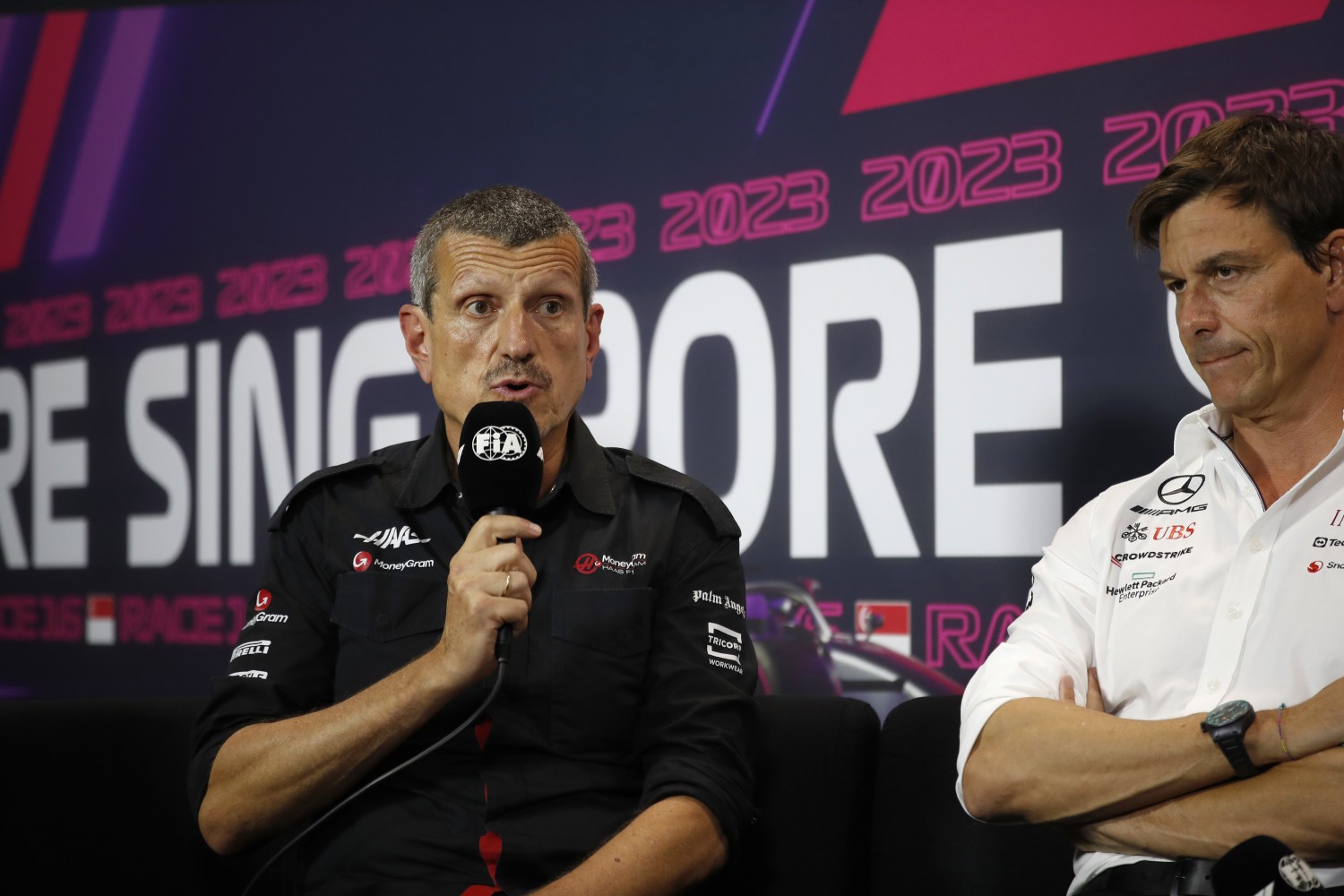 Guenther Steiner, Team Principal, Haas F1 Team, and Toto Wolff, Team Principal and CEO, Mercedes-AMG, in the team principals Press Conference during the Singapore GP at Marina Bay Street Circuit on Friday September 15, 2023 in Singapore, Singapore. (Photo by Jake Grant / LAT Images)