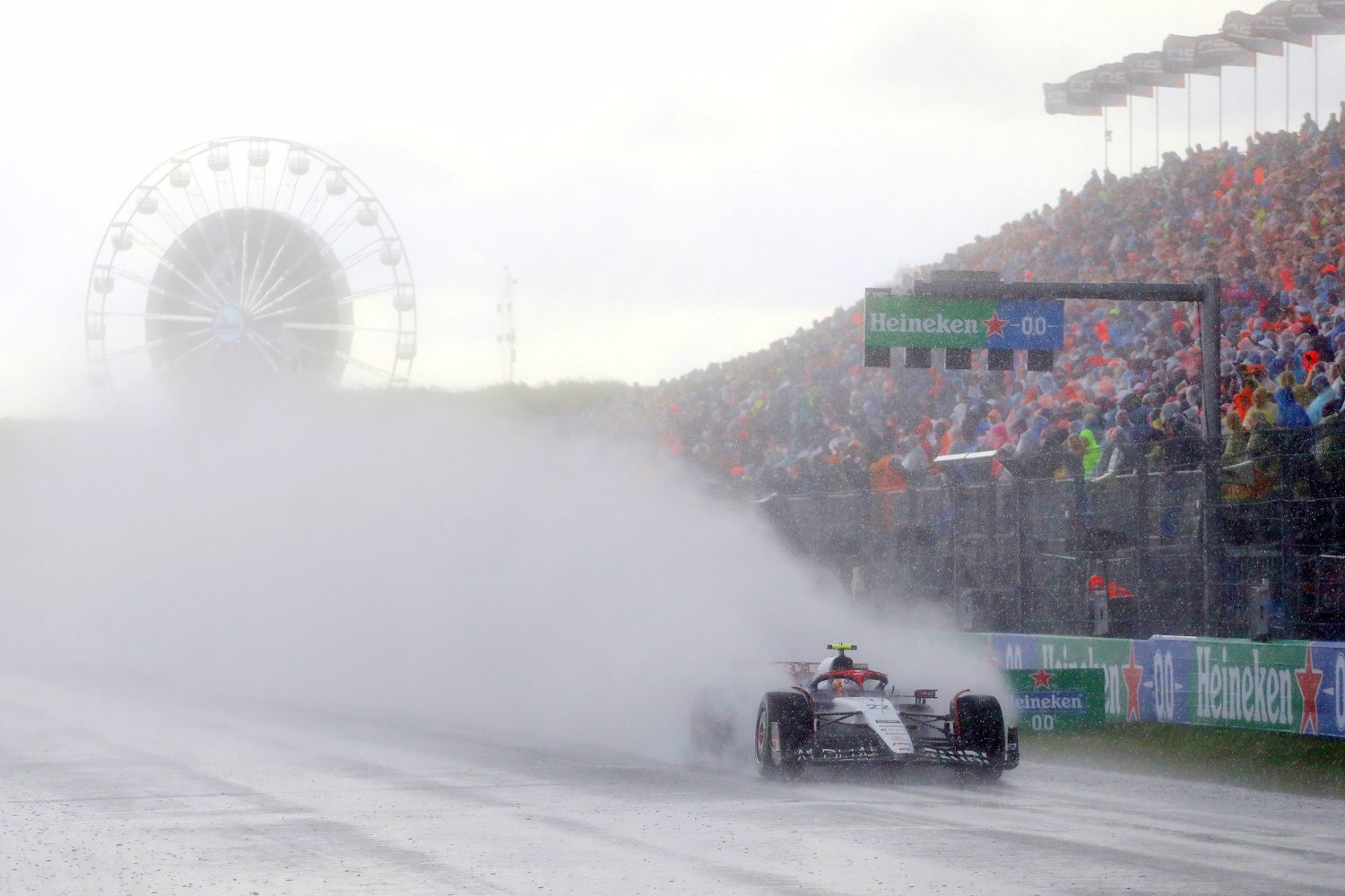 Yuki Tsunoda of Japan driving the (22) Scuderia AlphaTauri AT04 in the rain during the F1 Grand Prix of The Netherlands at Circuit Zandvoort on August 27, 2023 in Zandvoort, Netherlands. (Photo by Peter Fox/Getty Images) // Getty Images / Red Bull Content Pool //