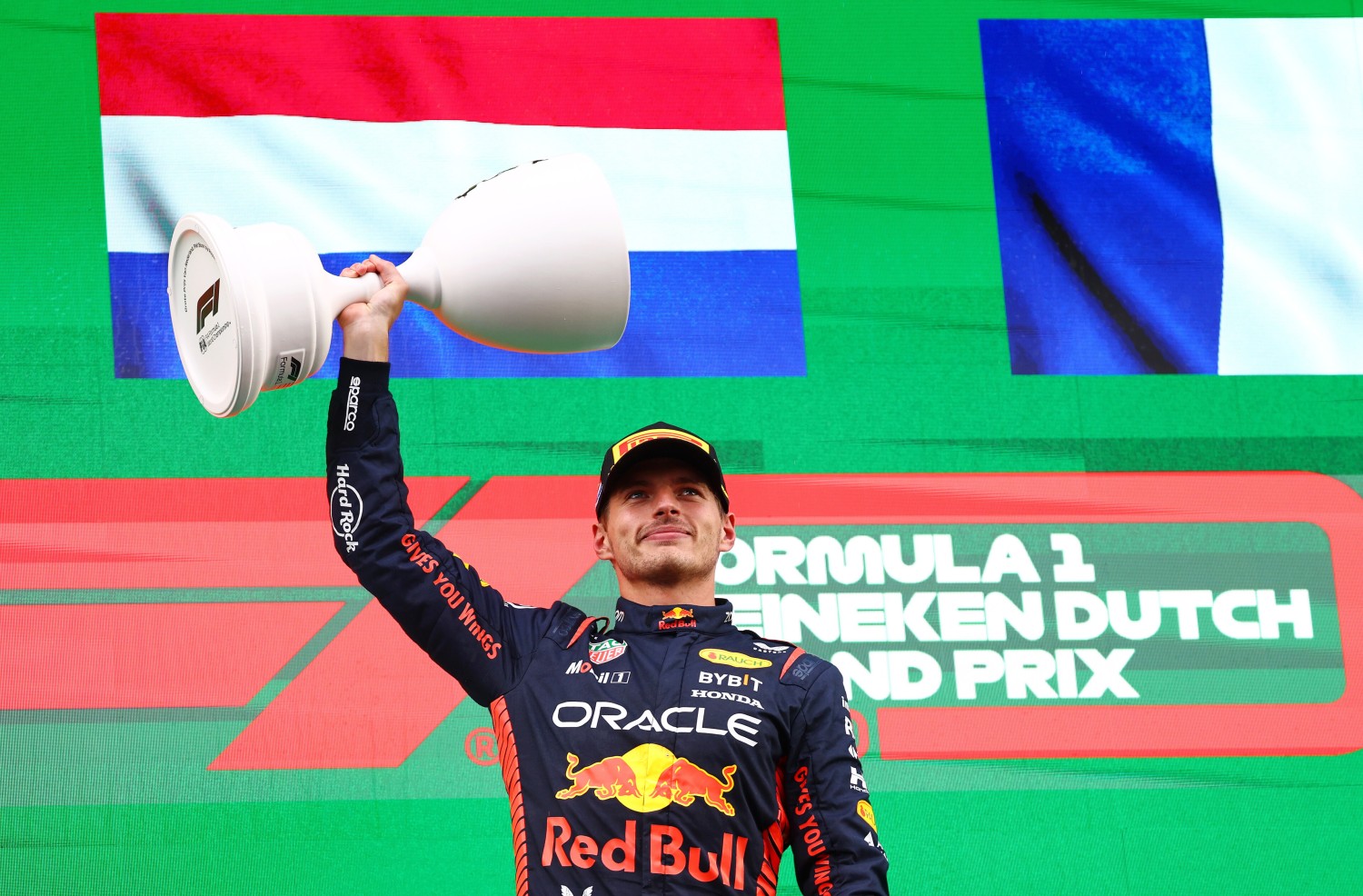 Race winner Max Verstappen of the Netherlands and Oracle Red Bull Racing celebrates on the podium during the F1 Grand Prix of The Netherlands at Circuit Zandvoort on August 27, 2023 in Zandvoort, Netherlands. (Photo by Mark Thompson/Getty Images) // Getty Images / Red Bull Content Pool