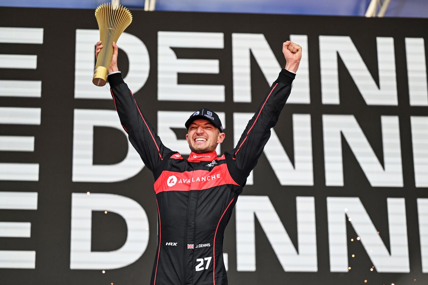 Jake Dennis, Avalanche Andretti Formula E, 1st position, with his trophy on the podium during the Rome ePrix II at Circuito Cittadino dell'EUR on Sunday July 16, 2023 in Rome, Italy. (Photo by Simon Galloway / LAT Images)