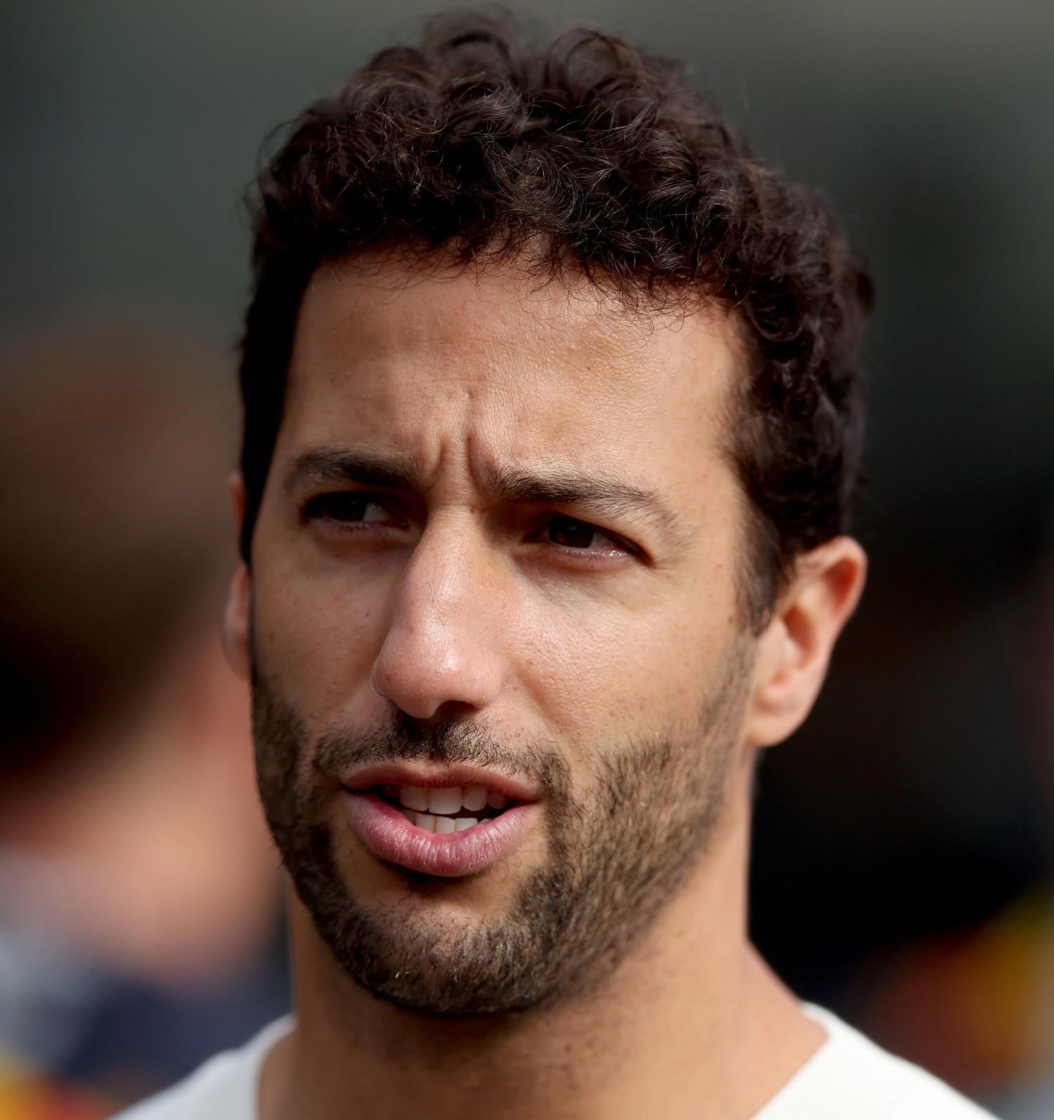 Daniel Ricciardo of Australia and Scuderia AlphaTauri looks on in the Paddock prior to practice ahead of the F1 Grand Prix of The Netherlands at Circuit Zandvoort on August 25, 2023 in Zandvoort, Netherlands. (Photo by Lars Baron/Getty Images) // Getty Images / Red Bull Content Pool