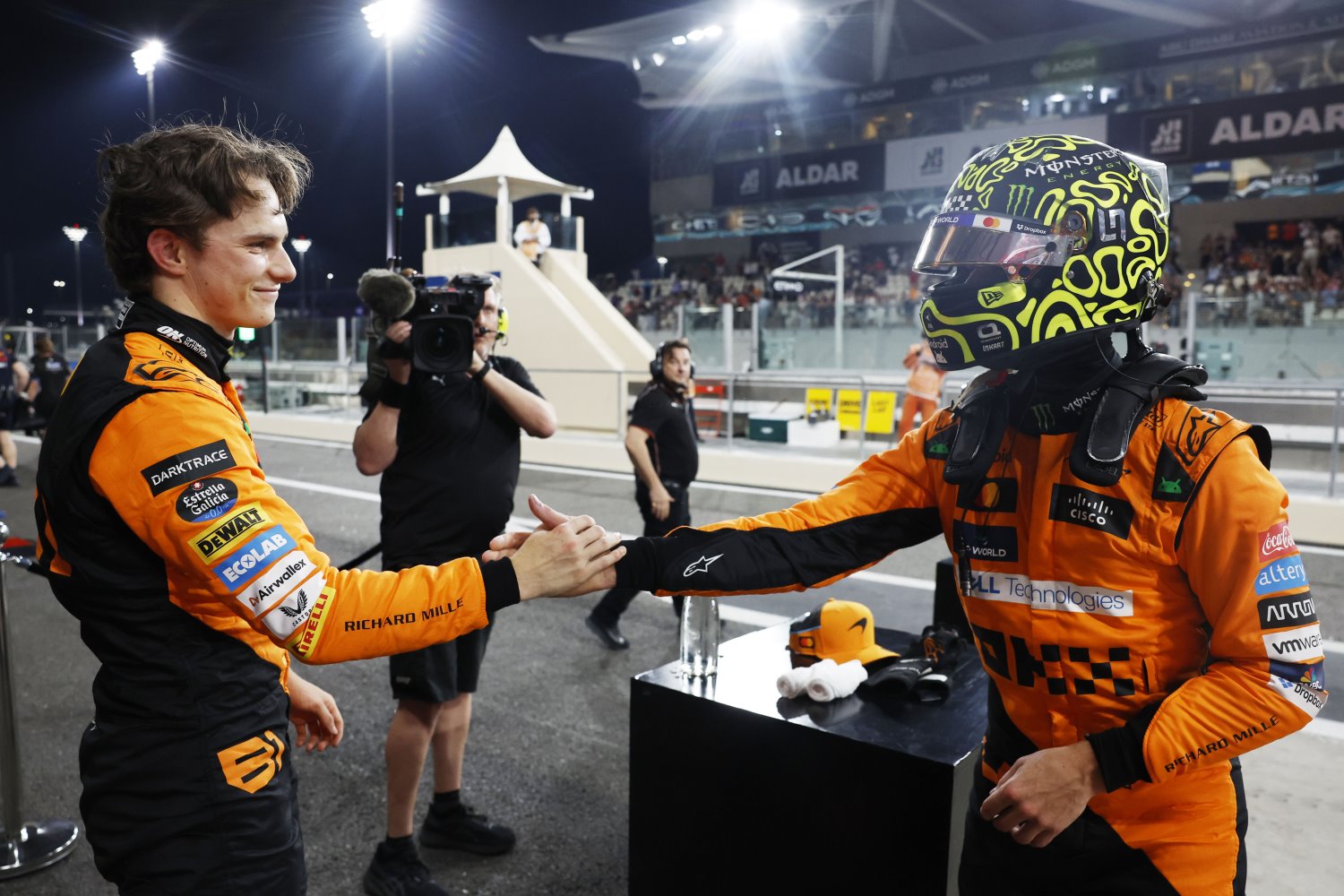 Oscar Piastri, McLaren F1 Team, and pole man Lando Norris, McLaren F1 Team, congratulate each other in Parc Ferme