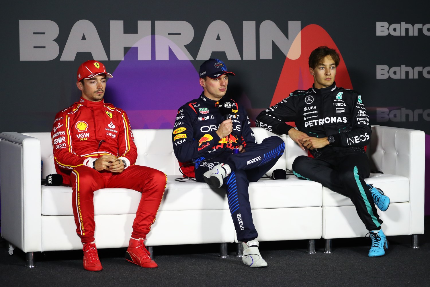 Pole position qualifier Max Verstappen of the Netherlands and Oracle Red Bull Racing, Second placed Charles Leclerc of Monaco and Ferrari and Third placed George Russell of Great Britain and Mercedes attend a press conference after qualifying ahead of the F1 Grand Prix of Bahrain at Bahrain International Circuit on March 01, 2024 in Bahrain, Bahrain. (Photo by Peter Fox/Getty Images) // Getty Images / Red Bull Content Pool