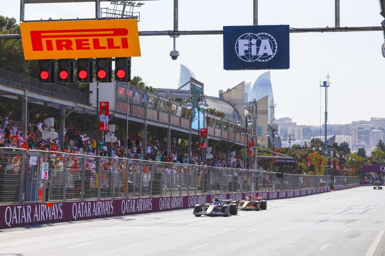 Pierre Gasly, Alpine A524, leads Oscar Piastri, McLaren MCL38 during the Azerbaijan GP at Baku City Circuit