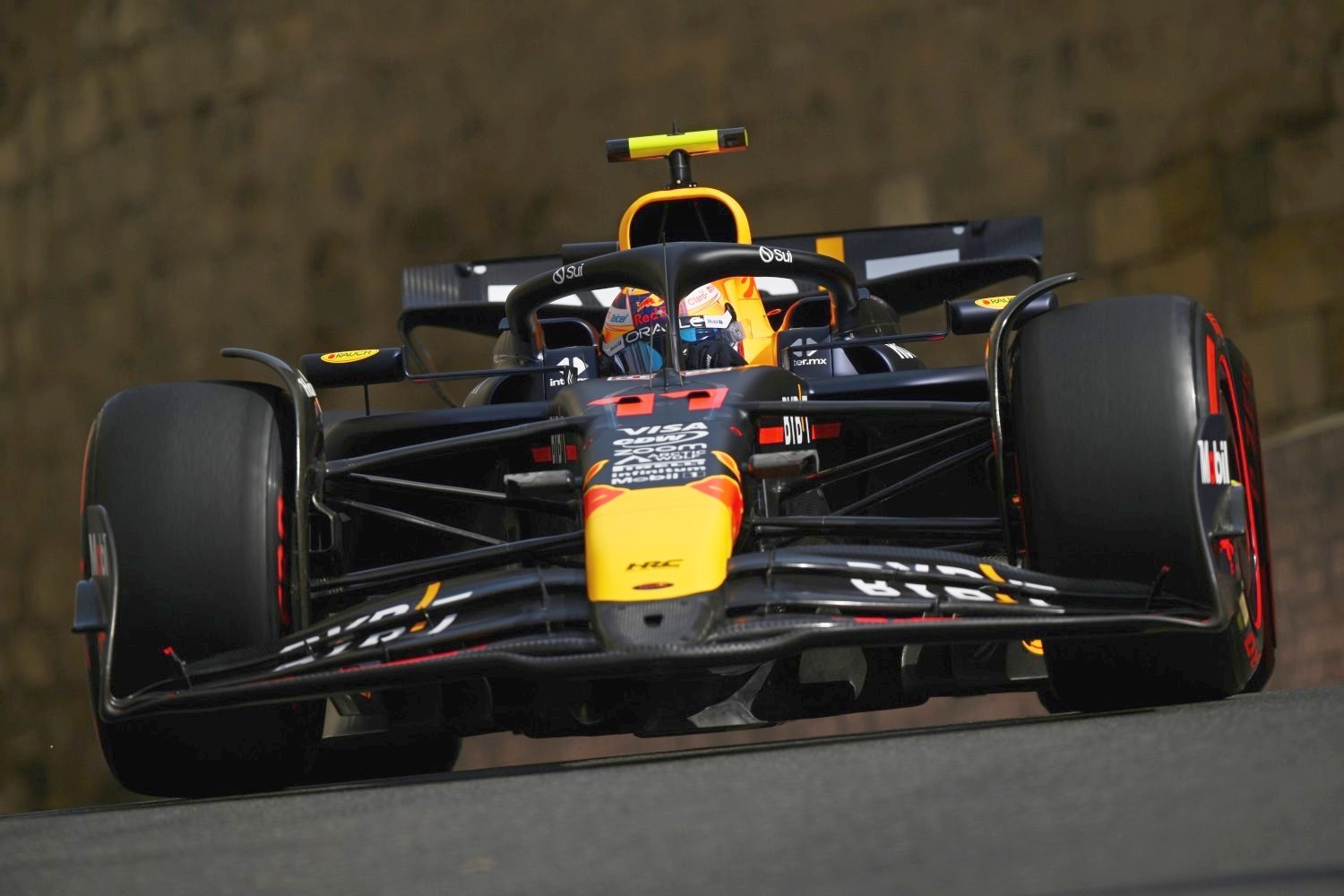 Sergio Perez of Mexico driving the (11) Oracle Red Bull Racing RB20 on track during practice ahead of the F1 Grand Prix of Azerbaijan at Baku City Circuit on September 13, 2024 in Baku, Azerbaijan. (Photo by Clive Mason/Getty Images)