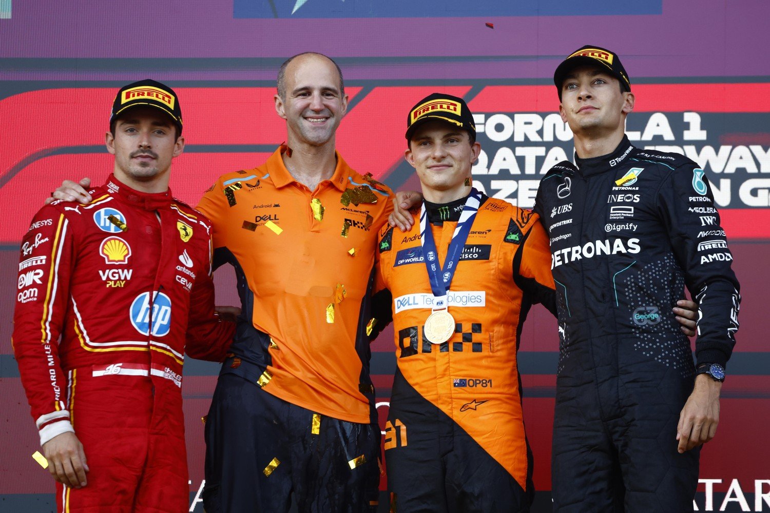 Oscar Piastri, McLaren F1 Team, 1st position, with Charles Leclerc, Scuderia Ferrari, 2nd position, George Russell, Mercedes-AMG F1 Team, 3rd position, and Tom Stallard, Race Engineer, McLaren F1 Team, , Azerbaijan GP