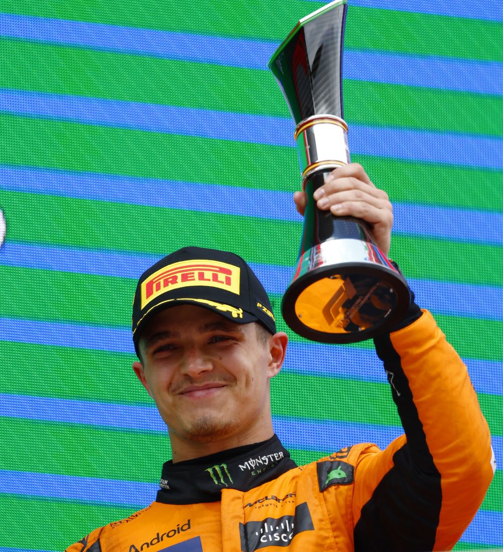 Lando Norris, McLaren F1 Team, 2nd position, lifts the trophy in celebration during the Spanish GP at Circuit de Barcelona-Catalunya on Sunday June 23, 2024 in Barcelona, Spain. (Photo by Sam Bloxham / LAT Images)
