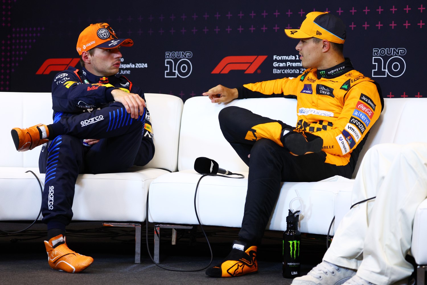 2nd placed qualifier Max Verstappen of the Netherlands and Oracle Red Bull Racing and Pole position qualifier Lando Norris of Great Britain and McLaren attend the press conference after qualifying ahead of the F1 Grand Prix of Spain at Circuit de Barcelona-Catalunya on June 22, 2024 in Barcelona, Spain. (Photo by Clive Rose/Getty Images) // Getty Images / Red Bull Content Pool //