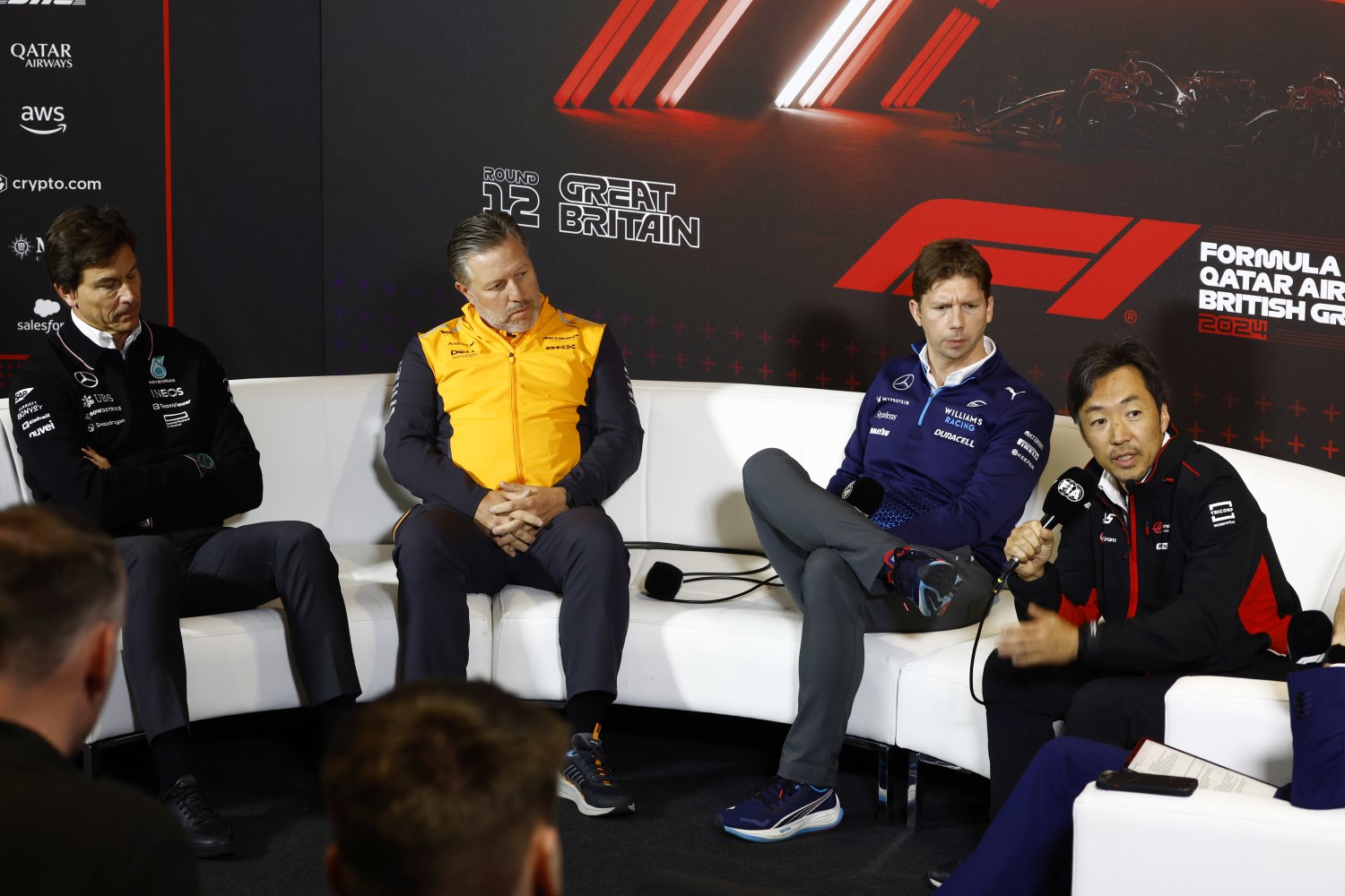 Toto Wolff, Team Principal and CEO, Mercedes-AMG F1 Team, with Zak Brown, CEO, McLaren Racing, James Vowles, Team Principal, Williams Racing, and Ayao Komatsu, Team Principal, Haas F1 Team during the British GP at Silverstone Circuit on Friday July 05, 2024 in Northamptonshire, United Kingdom. (Photo by Zak Mauger / LAT Images)