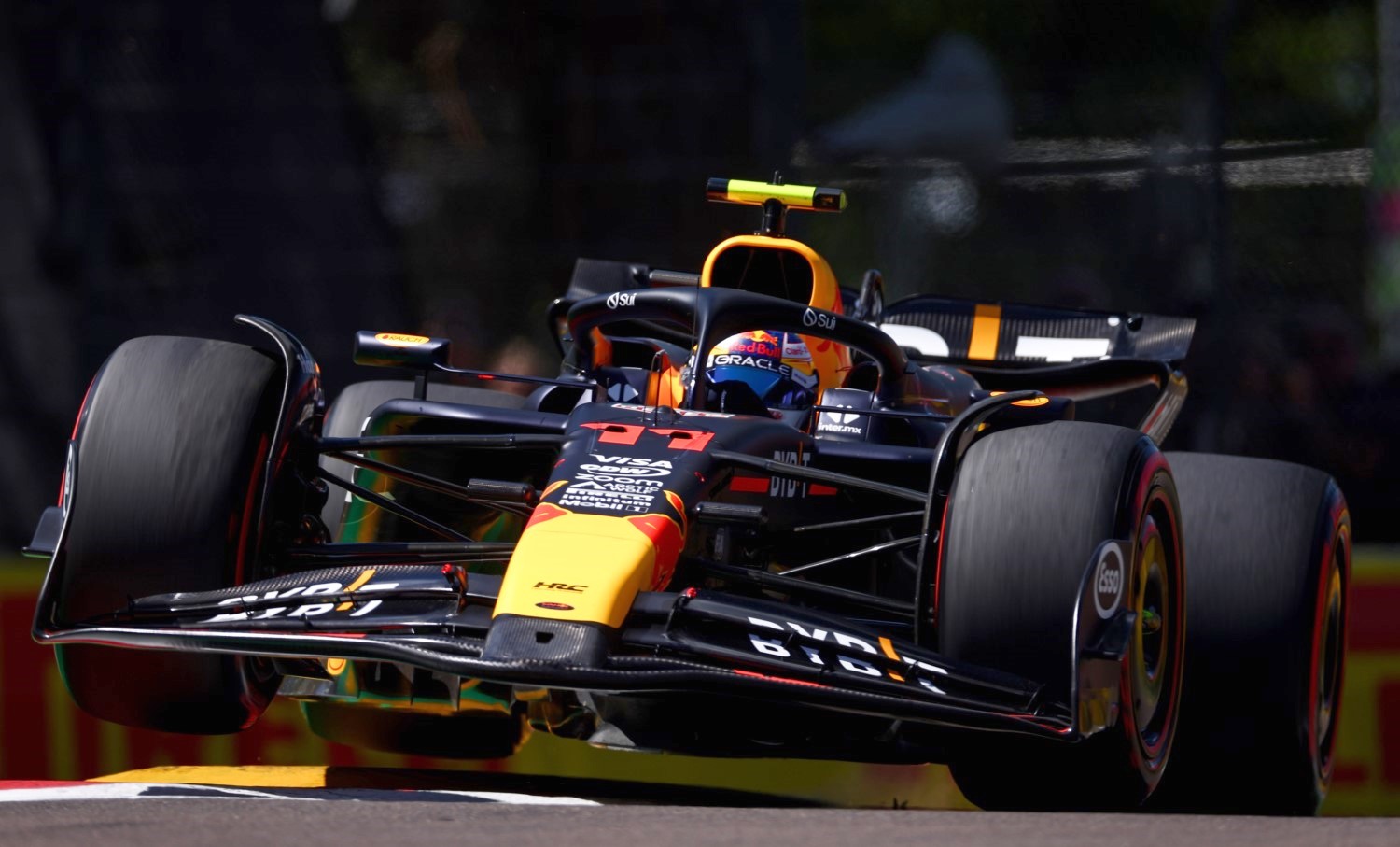 Sergio Perez of Mexico driving the (11) Oracle Red Bull Racing RB20 on track during practice ahead of the F1 Grand Prix of Emilia-Romagna at Autodromo Enzo e Dino Ferrari Circuit on May 17, 2024 in Imola, Italy. (Photo by Lars Baron/Getty Images) // Getty Images / Red Bull Content Pool