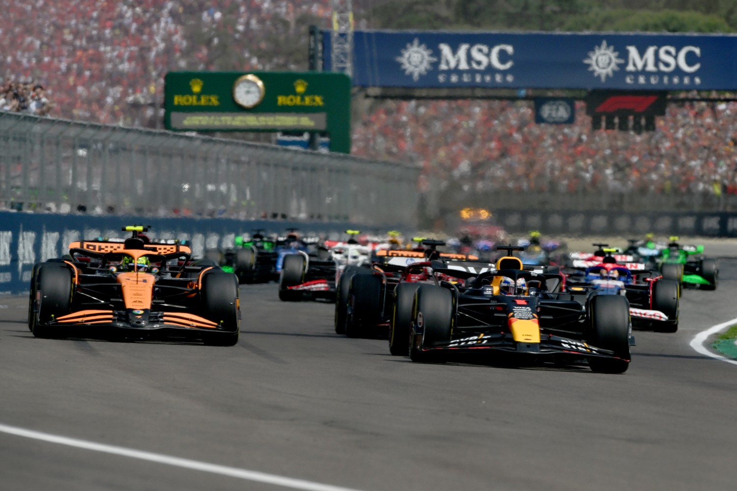 Max Verstappen of the Netherlands driving the (1) Oracle Red Bull Racing RB20 leads the field into turn one at the start during the F1 Grand Prix of Emilia-Romagna at Autodromo Enzo e Dino Ferrari Circuit on May 19, 2024 in Imola, Italy. (Photo by Rudy Carezzevoli/Getty Images)