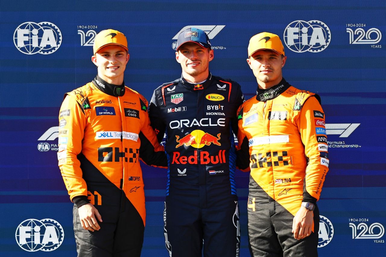 Pole position qualifier Max Verstappen of the Netherlands and Oracle Red Bull Racing, Second placed qualifier Oscar Piastri of Australia and McLaren and Third placed qualifier Lando Norris of Great Britain and McLaren pose for a photo in parc ferme during qualifying ahead of the F1 Grand Prix of Emilia-Romagna at Autodromo Enzo e Dino Ferrari Circuit on May 18, 2024 in Imola, Italy. (Photo by Mark Thompson/Getty Images)
