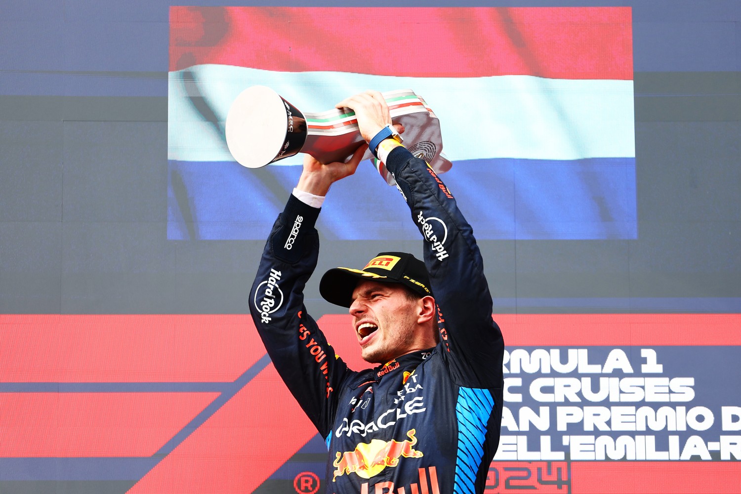Can he win again in Monaco? Imola Race winner Max Verstappen of the Netherlands and Oracle Red Bull Racing celebrates on the podium during the F1 Grand Prix of Emilia-Romagna at Autodromo Enzo e Dino Ferrari Circuit on May 19, 2024 in Imola, Italy. (Photo by Mark Thompson/Getty Images)