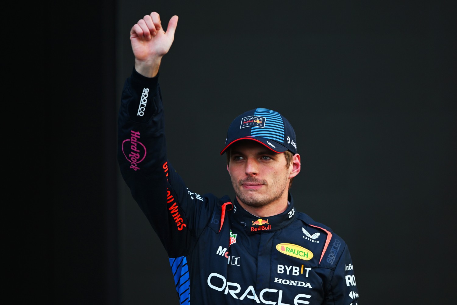 Second placed qualifier Max Verstappen of the Netherlands and Oracle Red Bull Racing waves to the crowd in parc ferme during qualifying ahead of the F1 Grand Prix of Mexico at Autodromo Hermanos Rodriguez on October 26, 2024 in Mexico City, Mexico. (Photo by Rudy Carezzevoli/Getty Images) // Getty Images / Red Bull Content Pool