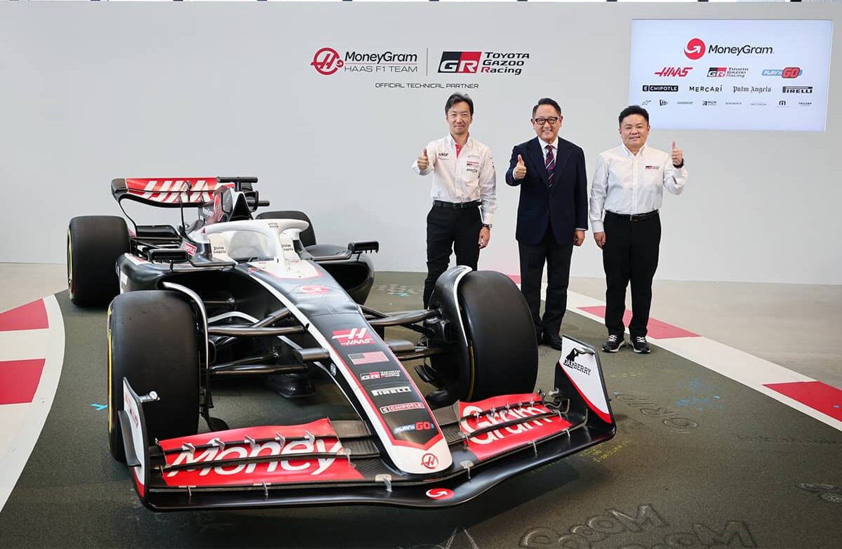 From left MoneyGram Haas F1 Team Team Principal Ayao Komatsu, Toyota Motor Corporation Chairman Akio Toyoda, and GAZOO Racing Company President Tomoya Takahashi