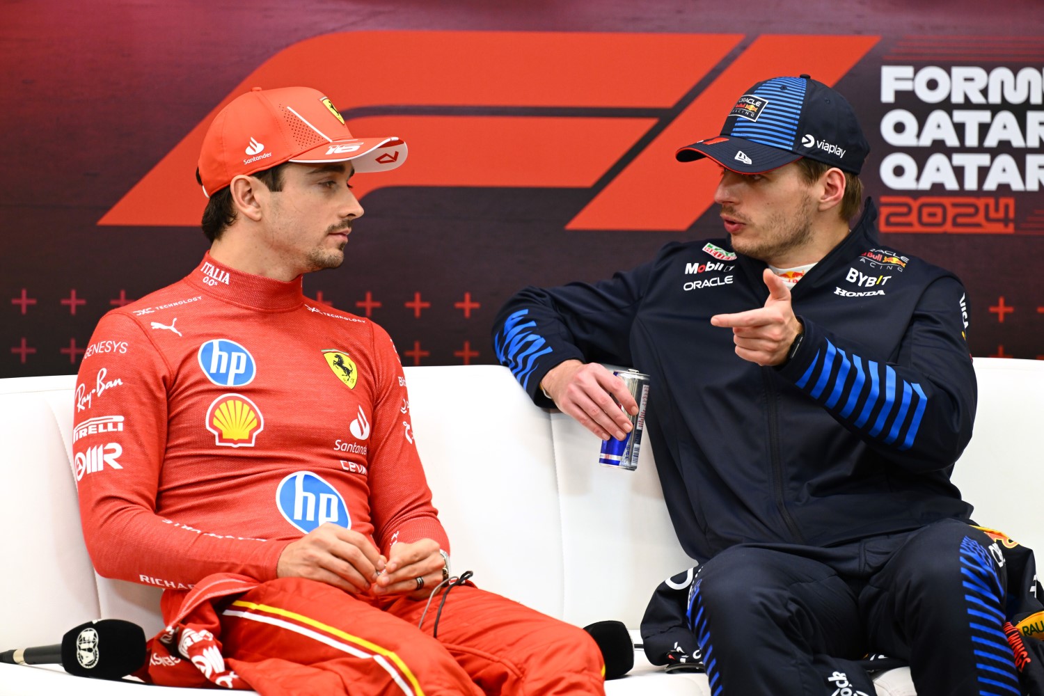 Race winner Max Verstappen of the Netherlands and Oracle Red Bull Racing and Charles Leclerc of Monaco and Ferrari attend the press conference after the F1 Qatar GP at Lusail International Circuit on December 01, 2024 in Lusail City, Qatar. (Photo by Mark Sutton/Getty Images) // Getty Images / Red Bull Content Pool 