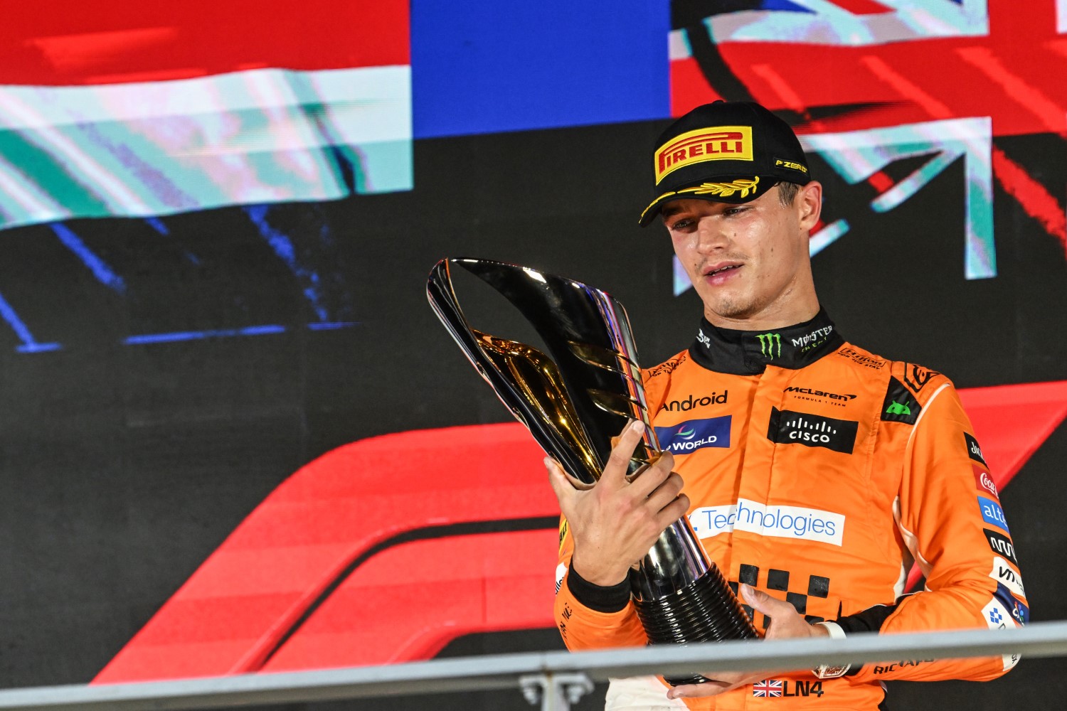 Lando Norris, McLaren F1 Team, 1st position, admires his trophy