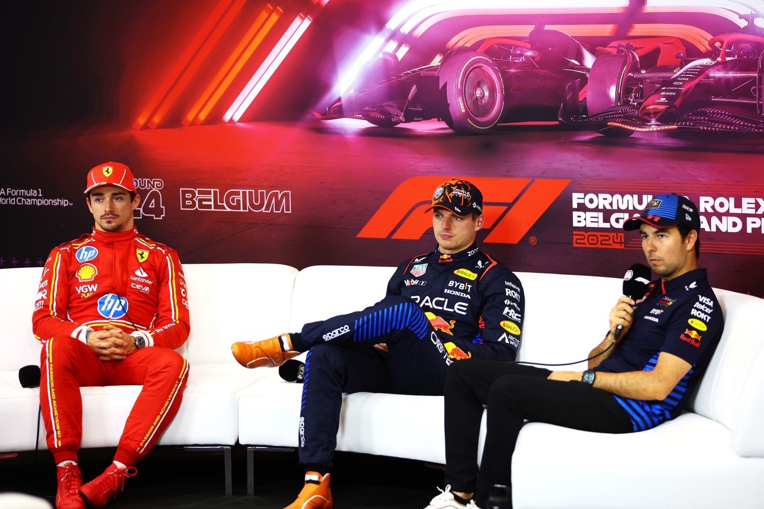 Pole position qualifier Max Verstappen of the Netherlands and Oracle Red Bull Racing, Second placed Charles Leclerc of Monaco and Ferrari and Third placed Sergio Perez of Mexico and Oracle Red Bull Racing attend the press conference after qualifying ahead of the F1 Grand Prix of Belgium at Circuit de Spa-Francorchamps on July 27, 2024 in Spa, Belgium. (Photo by Bryn Lennon - Formula 1/Formula 1 via Getty Images)