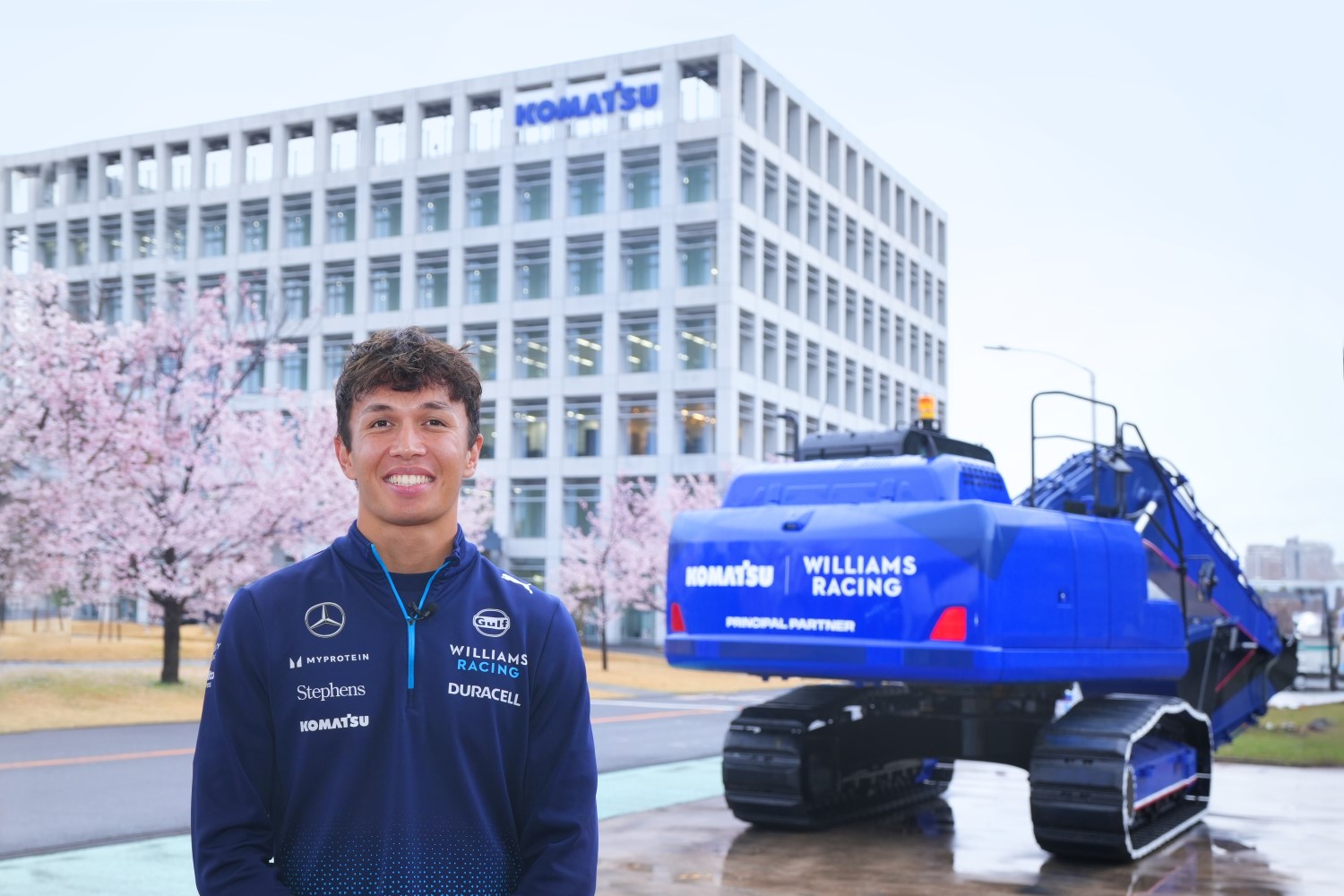 Alex Albon visits the Komatsu Osaka Plant in bloom