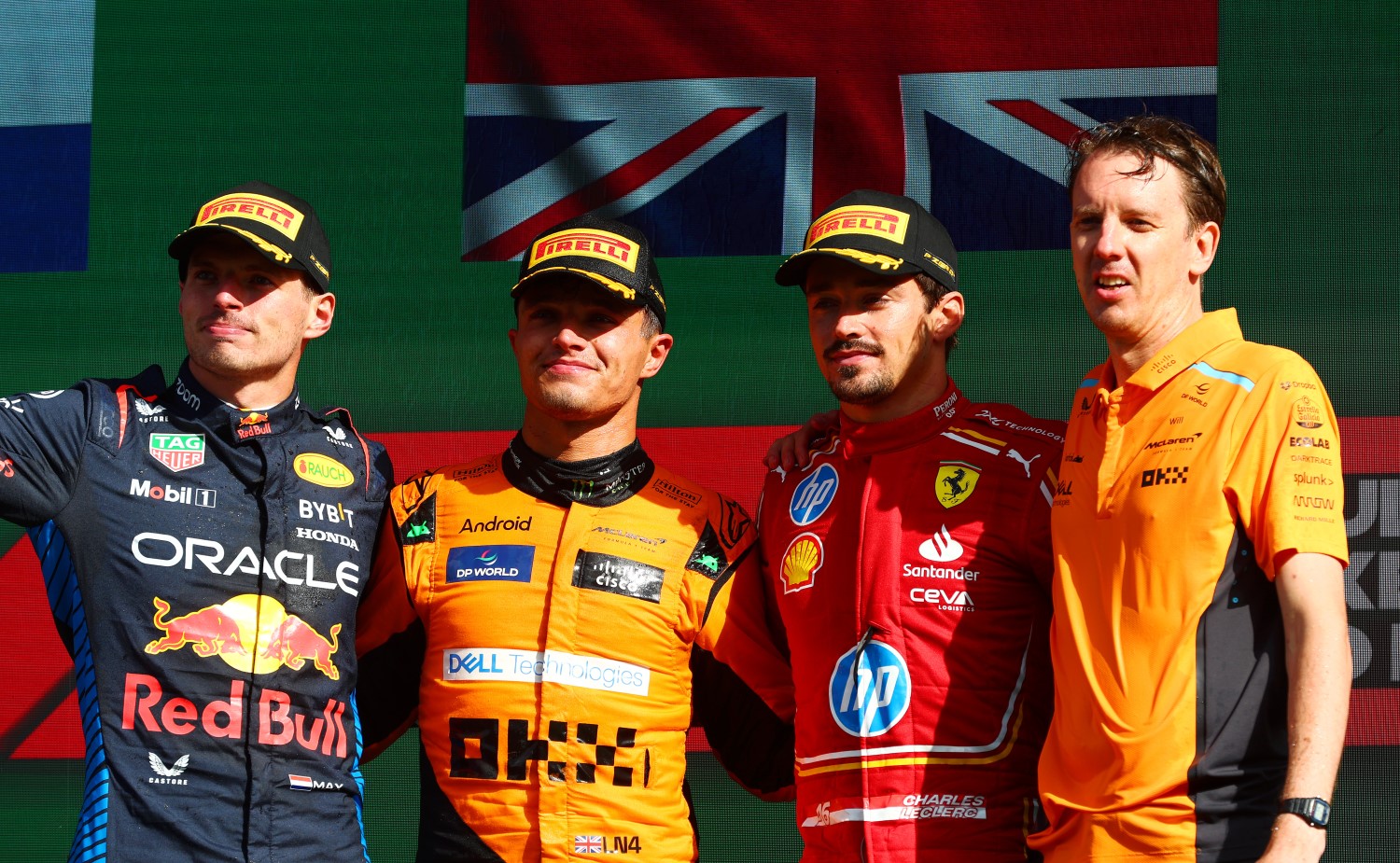 Second placed Max Verstappen of the Netherlands and Oracle Red Bull Racing (L), race winner Lando Norris of Great Britain and McLaren (C-L), third placed Charles Leclerc of Monaco and Ferrari (C-R) and Will Joseph, Director, Race Engineering at McLaren (L) pose for a photo in parc ferme after the F1 Dutch GP at Circuit Zandvoort on August 25, 2024 in Zandvoort, Netherlands. (Photo by Joe Portlock/Getty Images) // Getty Images / Red Bull Content Pool