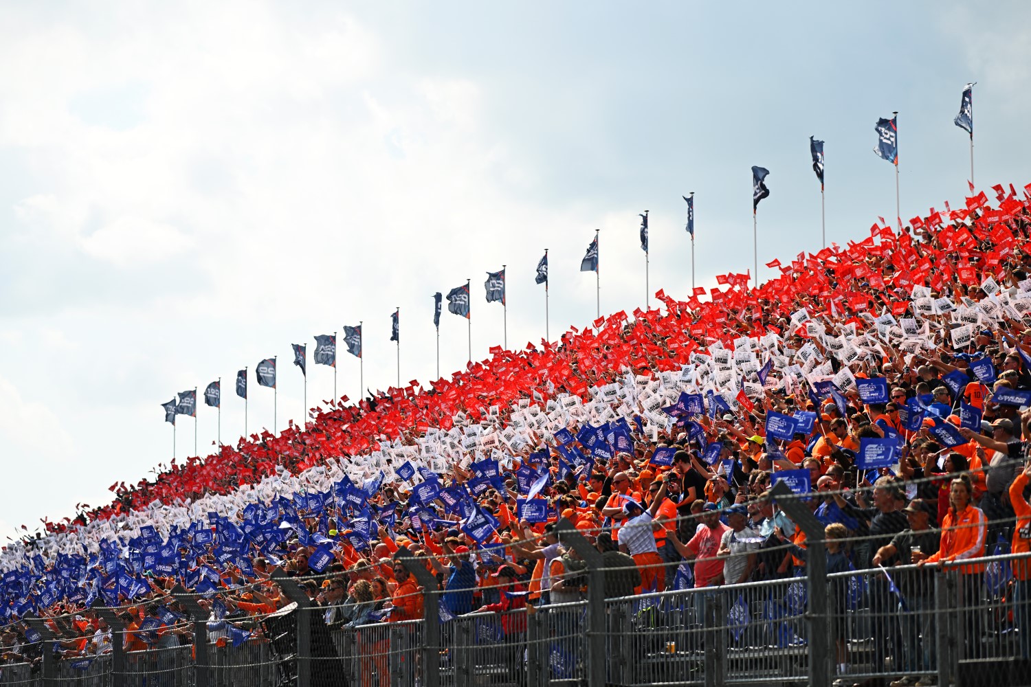 Fans of Max Verstappen of the Netherlands and Oracle Red Bull Racing show their support during the F1 Dutch GP at Circuit Zandvoort on August 25, 2024 in Zandvoort, Netherlands. (Photo by Rudy Carezzevoli/Getty Images) // Getty Images / Red Bull Content Pool