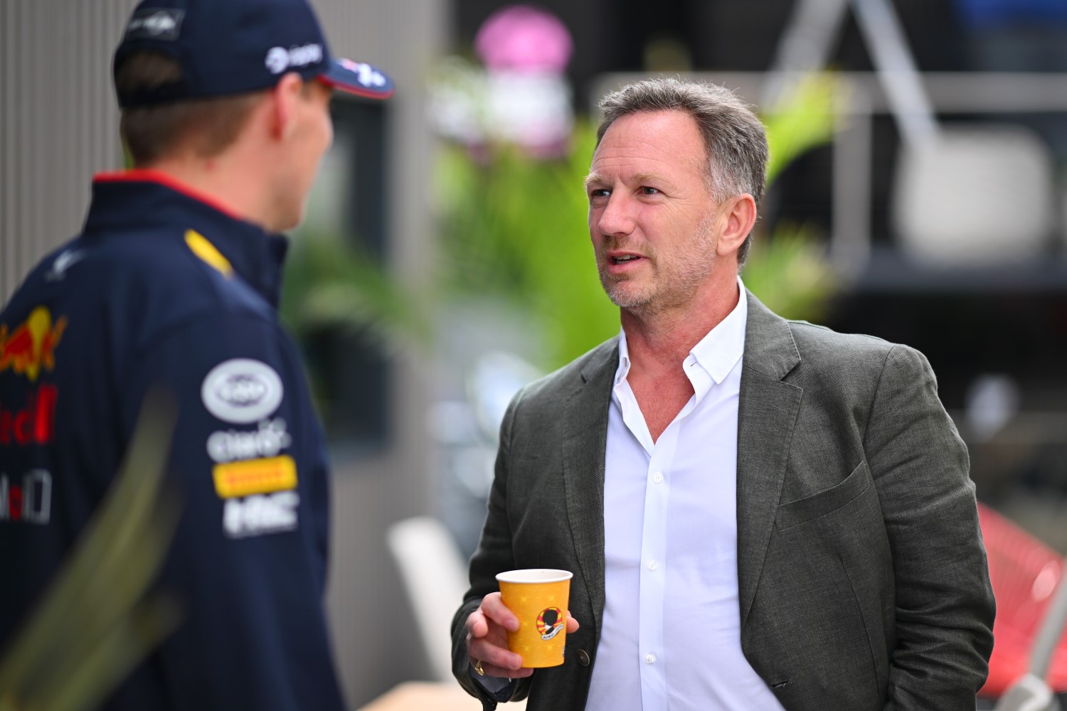 Oracle Red Bull Racing Team Principal Christian Horner talks with Max Verstappen of the Netherlands and Oracle Red Bull Racing in the Paddock during previews ahead of the F1 Grand Prix of Great Britain at Silverstone Circuit on July 04, 2024 in Northampton, England. (Photo by Rudy Carezzevoli/Getty Images) // Getty Images / Red Bull Content Pool