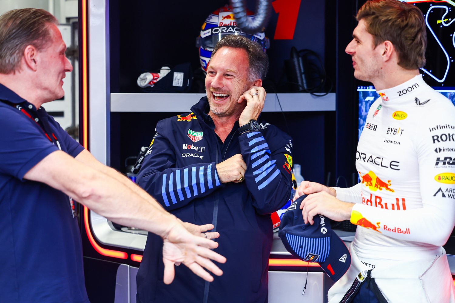 Oracle Red Bull Racing Team Principal Christian Horner, Max Verstappen of the Netherlands and Oracle Red Bull Racing and Jos Verstappen talk in the garage as they await the start of qualifying ahead of the F1 Grand Prix of Brazil at Autodromo Jose Carlos Pace on November 02, 2024 in Sao Paulo, Brazil. (Photo by Mark Thompson/Getty Images) // Getty Images / Red Bull Content Pool