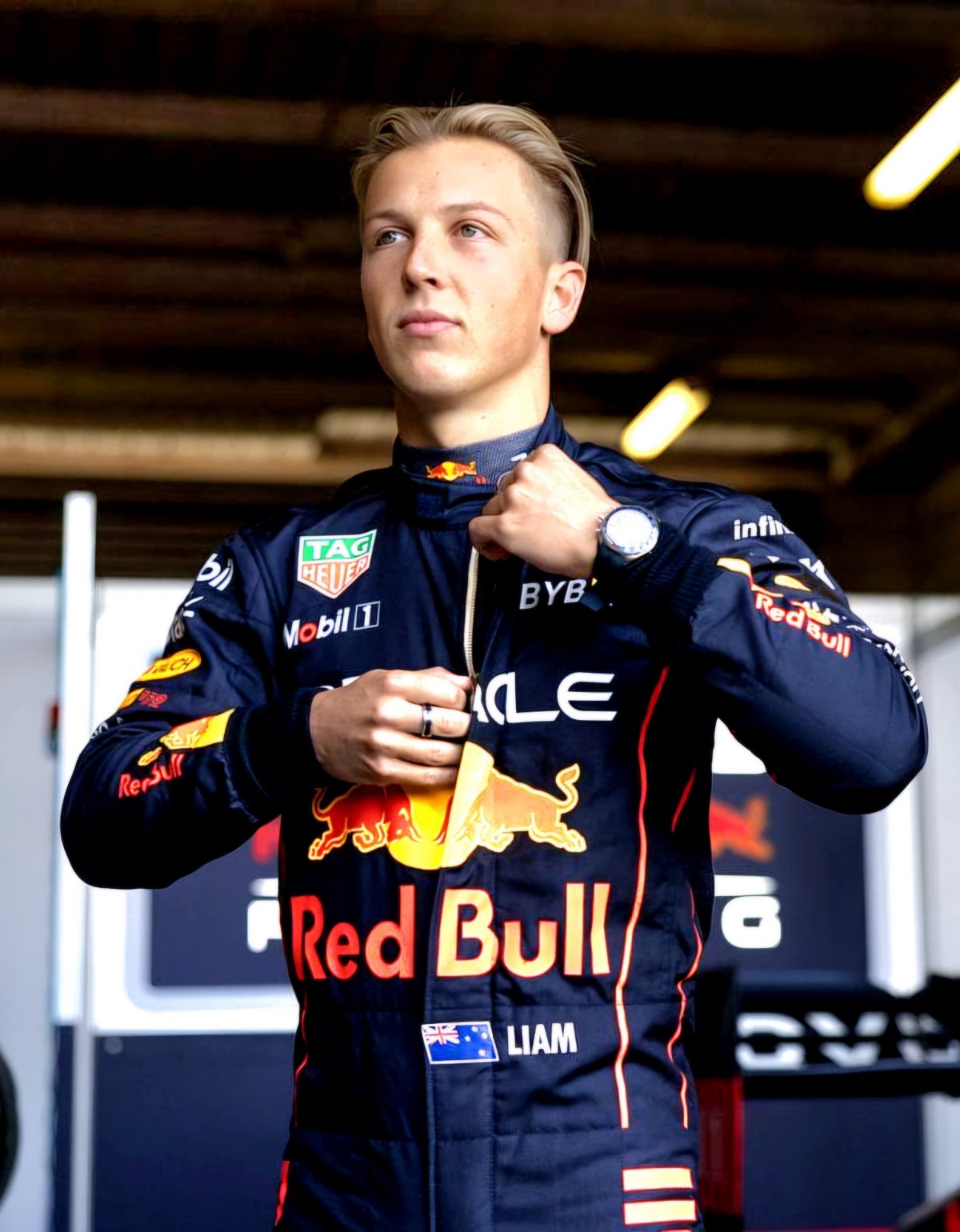 Lawson in Red Bull F1 Uniform for first time