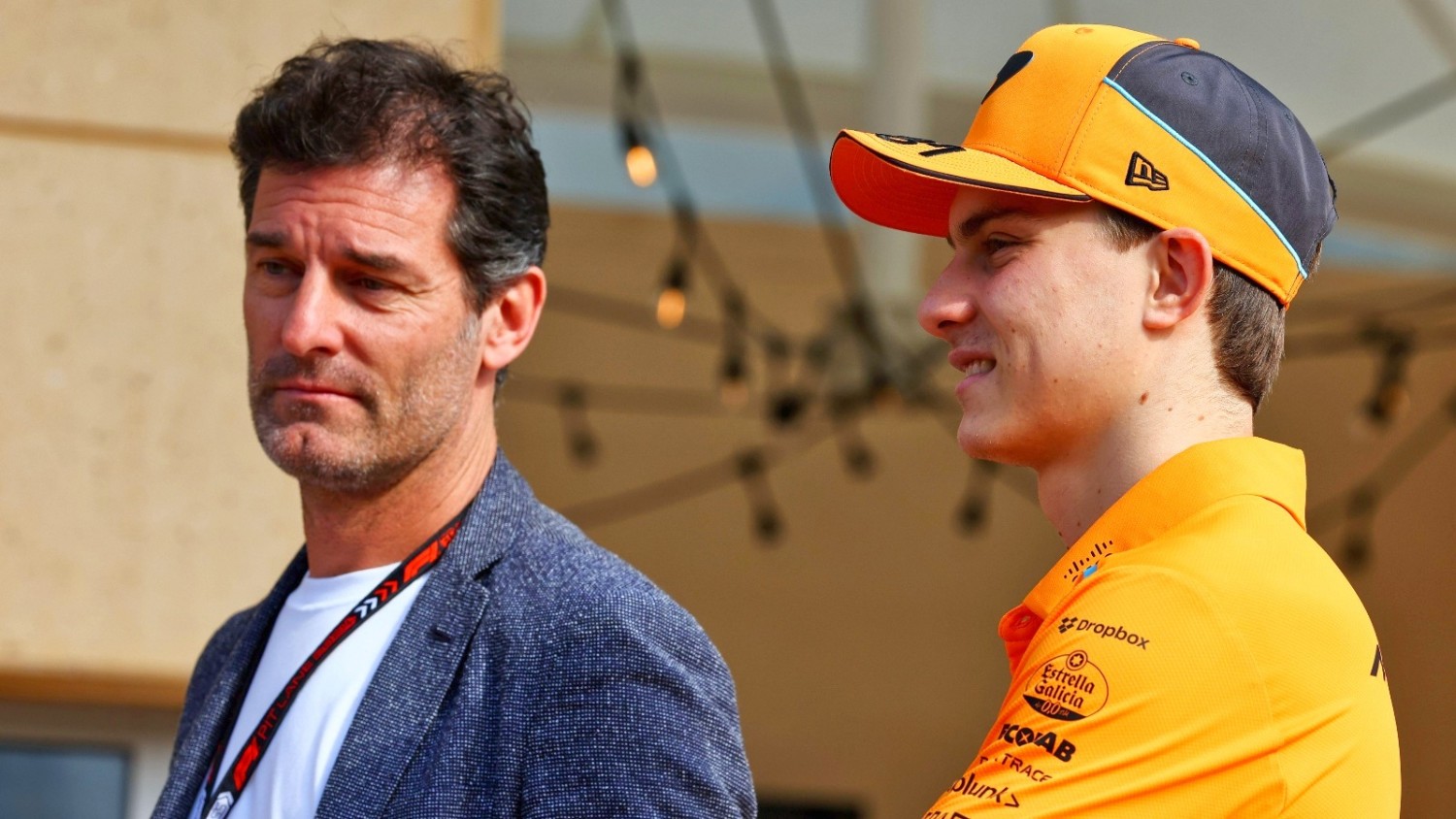 Oscar Piastri (R) and his business Manager, Mark Webber (L)