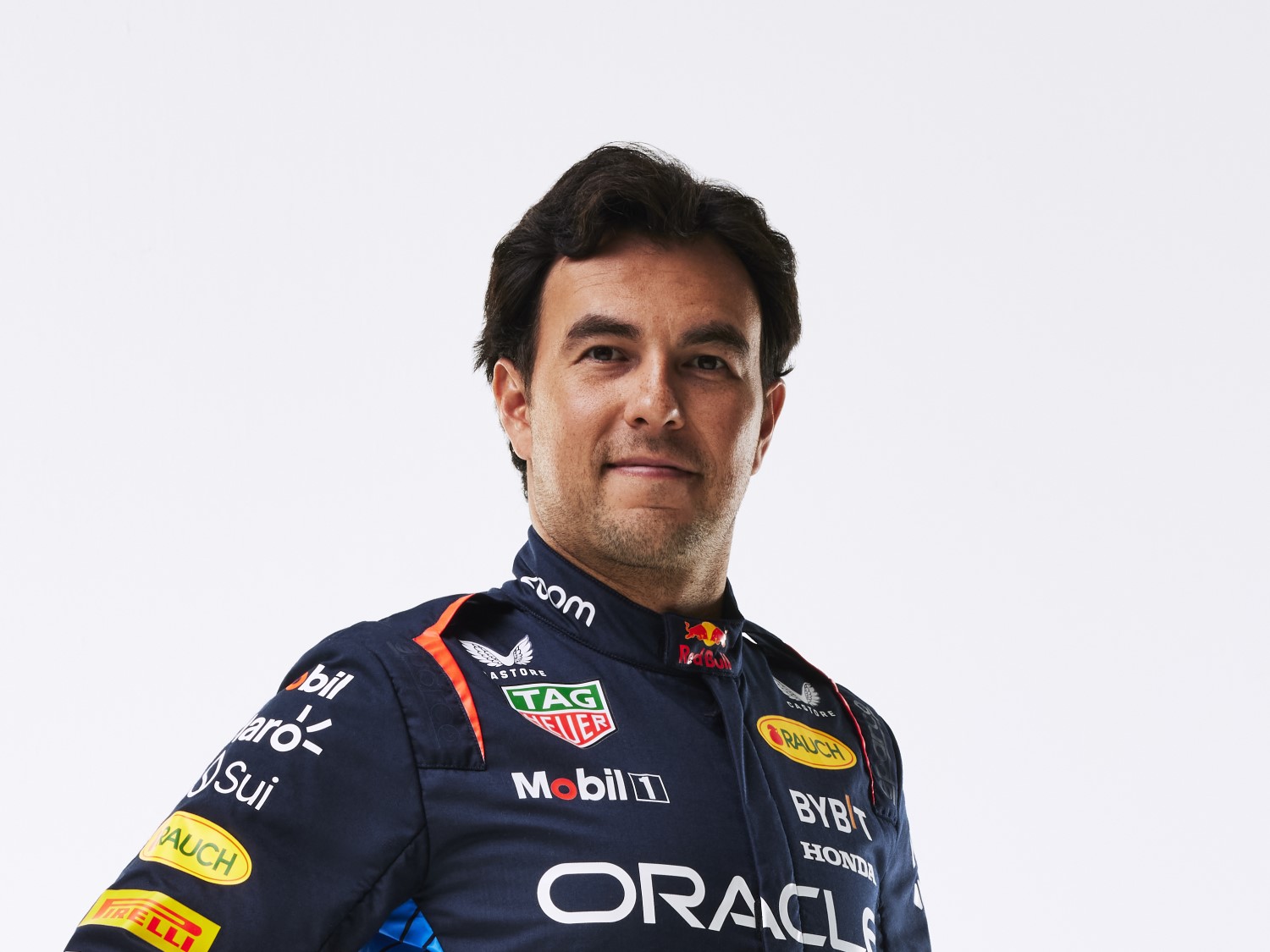 Sergio Perez poses for a portrait during Red Bull Racing 2024 Season Launch RB20 in London, UK on January 30, 2024 // Sam Todd / Red Bull Content Pool