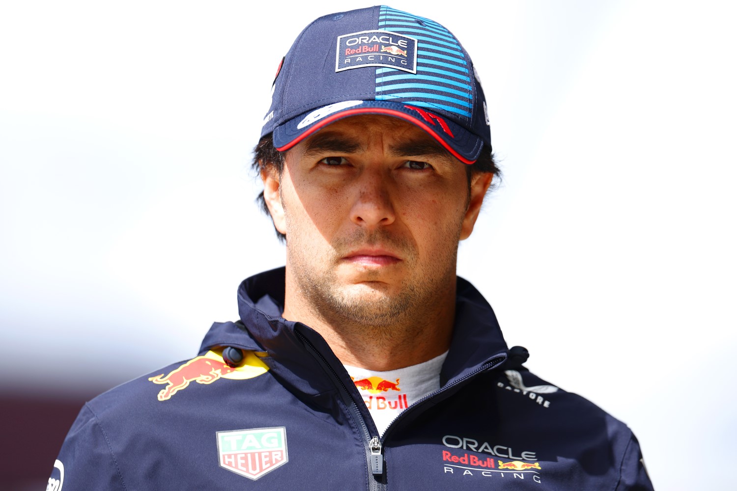 19th placed qualifier Sergio Perez of Mexico and Oracle Red Bull Racing walks in the Pitlane during qualifying ahead of the F1 Grand Prix of Great Britain at Silverstone Circuit on July 06, 2024 in Northampton, England. (Photo by Getty Images/Getty Images) // Getty Images / Red Bull Content Pool