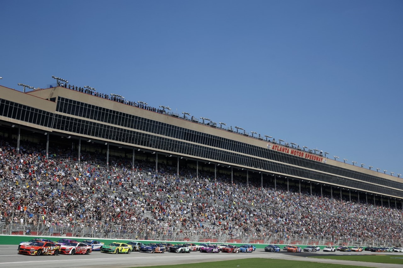 Michael McDowell, driver of the #34 B'laster Work It Like A Pro Ford, leads the field to start the NASCAR Cup Series Quaker State 400 Available at Walmart at Atlanta Motor Speedway on September 08, 2024 in Hampton, Georgia. (Photo by Sean Gardner/Getty Images)