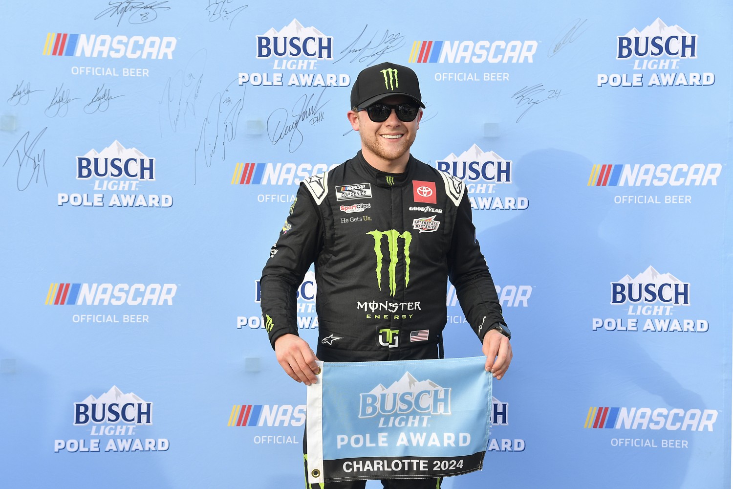 Ty Gibbs, driver of the #54 Monster Energy/Interstate Batteries Toyota, poses for photos after winning the pole award during qualifying for the NASCAR Cup Series Coca-Cola 600 at Charlotte Motor Speedway on May 25, 2024 in Concord, North Carolina. (Photo by Logan Riely/Getty Images)