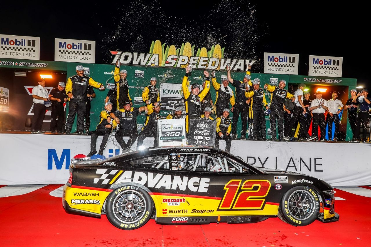 Ryan Blaney, driver of the #12 Advance Auto Parts Ford, celebrates in victory lane after winning the NASCAR Cup Series Iowa Corn 350 at Iowa Speedway on June 16, 2024 in Newton, Iowa. (Photo by James Gilbert/Getty Images for NASCAR)