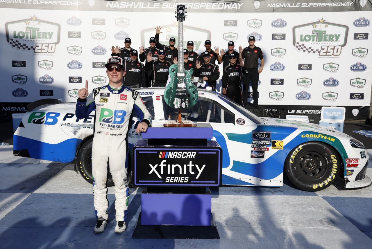 John Hunter Nemechek, driver of the #20 Pye Barker Fire & Safety Toyota, celebrates in victory lane after winning the NASCAR Xfinity Series Tennessee Lottery 250 at Nashville Superspeedway on June 29, 2024 in Lebanon, Tennessee. (Photo by Sean Gardner/Getty Images)