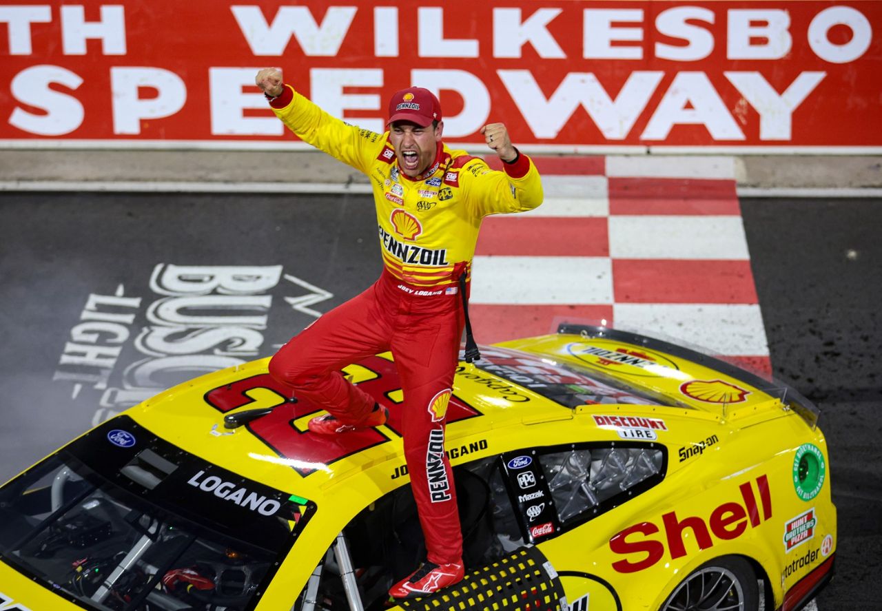 Joey Logano, driver of the #22 Shell Pennzoil Ford, celebrates after winning the NASCAR Cup Series All-Star Race at North Wilkesboro Speedway on May 19, 2024 in North Wilkesboro, North Carolina. (Photo by James Gilbert/Getty Images for NASCAR)