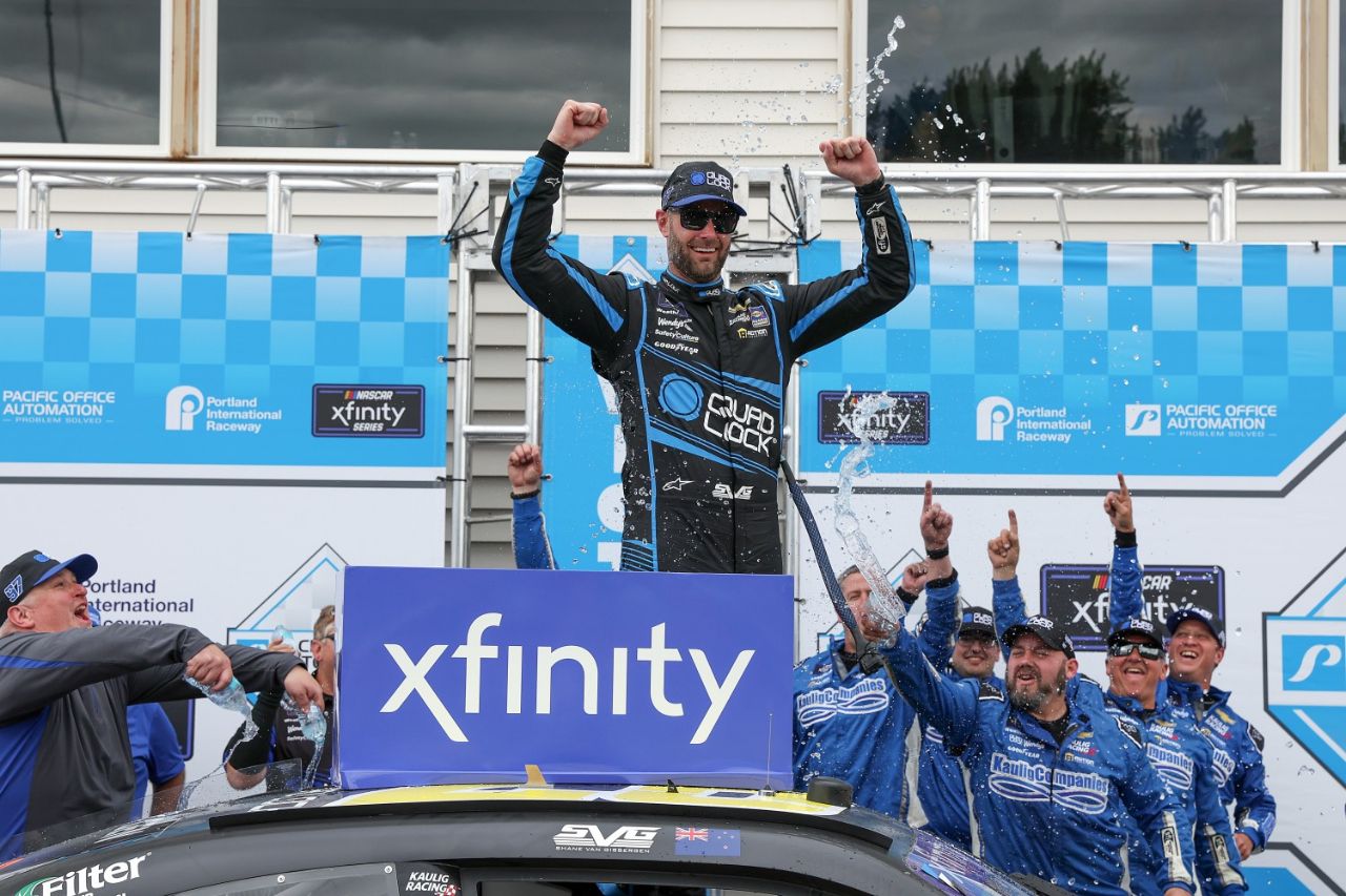 Shane Van Gisbergen, driver of the #97 Quad Lock Chevrolet, celebrates in victory lane after winning the NASCAR Xfinity Series Pacific Office Automation 147 at Portland International Raceway on June 01, 2024 in Portland, Oregon. (Photo by Meg Oliphant/Getty Images)
