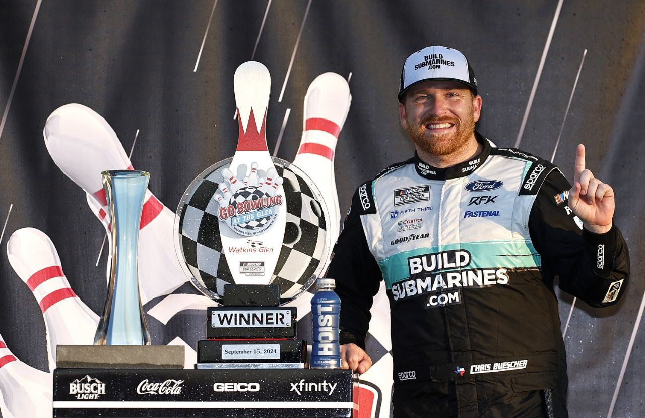 Chris Buescher, driver of the #17 BuildSubmarines.com Ford, celebrates in victory lane after winning the NASCAR Cup Series Go Bowling at The Glen at Watkins Glen International on September 15, 2024 in Watkins Glen, New York. (Photo by Chris Graythen/Getty Images)