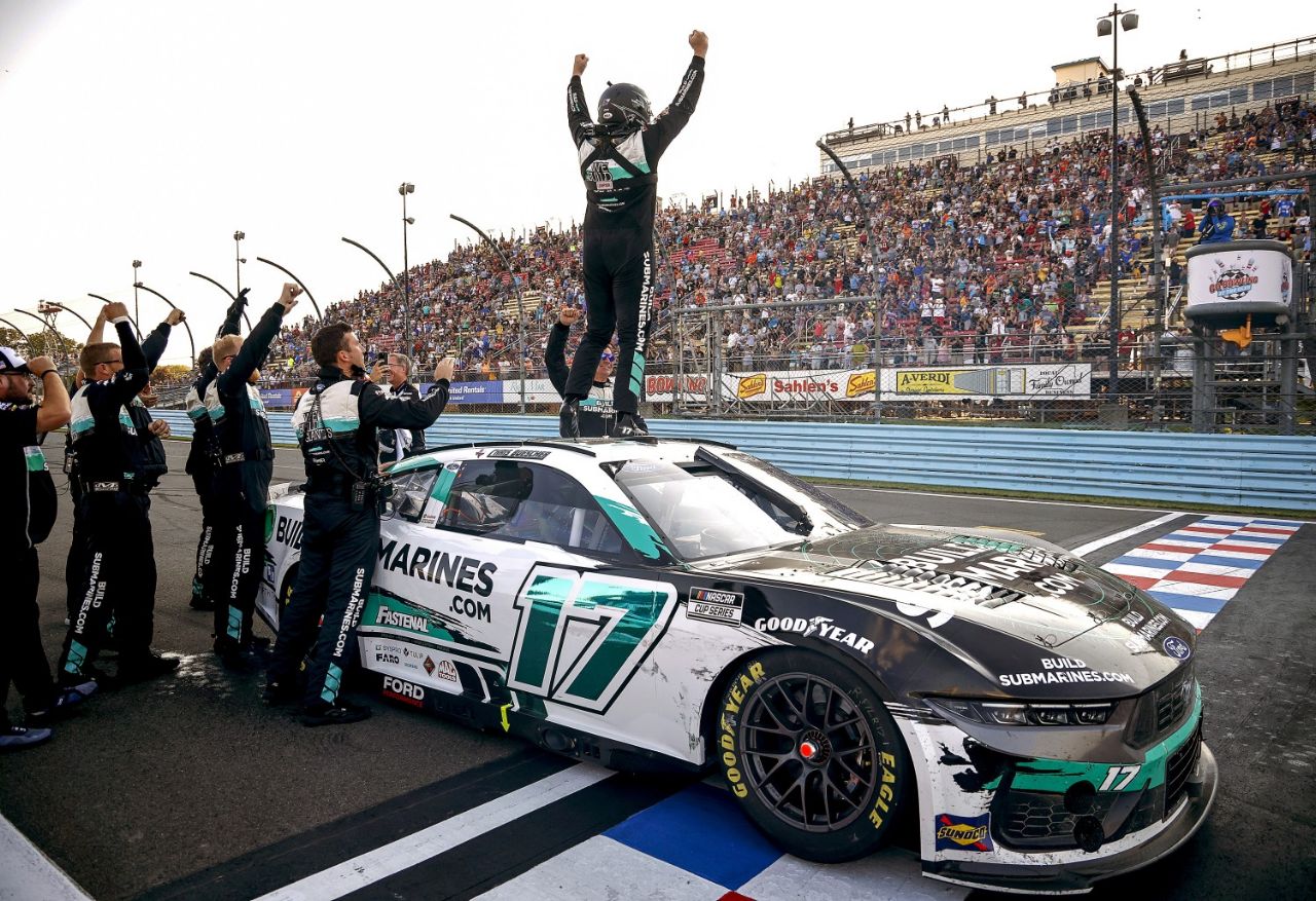 Chris Buescher, driver of the #17 BuildSubmarines.com Ford, celebrates after winning the NASCAR Cup Series Go Bowling at The Glen at Watkins Glen International on September 15, 2024 in Watkins Glen, New York. (Photo by Chris Graythen/Getty Images)