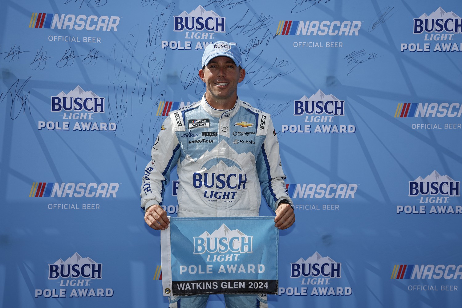 Ross Chastain, driver of the #1 Busch Light Chevrolet, poses for photos after winning the pole award during qualifying for the NASCAR Cup Series Go Bowling at The Glen at Watkins Glen International on September 14, 2024 in Watkins Glen, New York. (Photo by Chris Graythen/Getty Images)