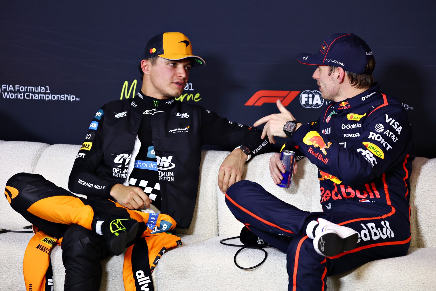 Pole position qualifier Lando Norris of Great Britain and McLaren and Third placed qualifier Max Verstappen of the Netherlands and Oracle Red Bull Racing talk in the Drivers Press Conference during qualifying ahead of the F1 Grand Prix of Australia at Albert Park Grand Prix Circuit on March 15, 2025 in Melbourne, Australia. (Photo by Clive Rose/Getty Images for McLaren)